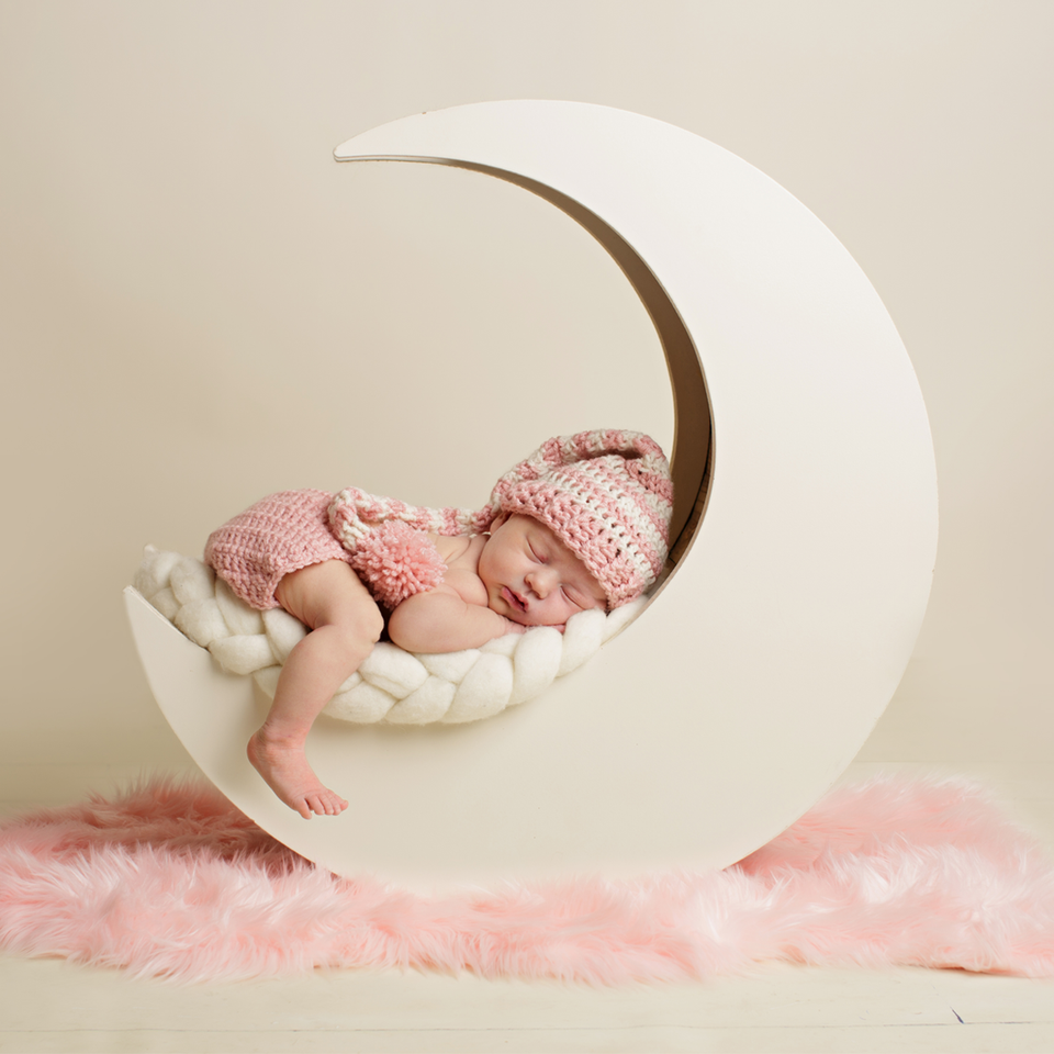 The Lunar Deco. Newborn sleeping on the moon. What gift for baby shower? The Lunar Deco one of the cutest newborn gifts!